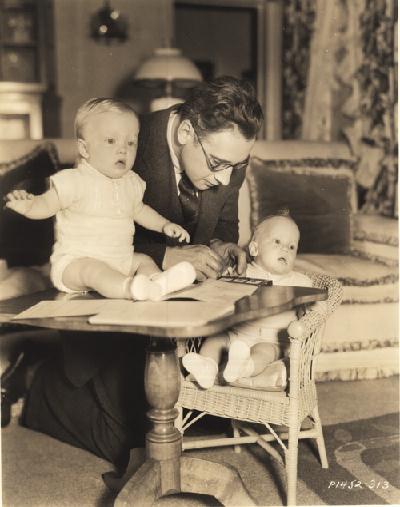 Captain H.L. Barlow fingerprinting Bing Crosby's twins 1935